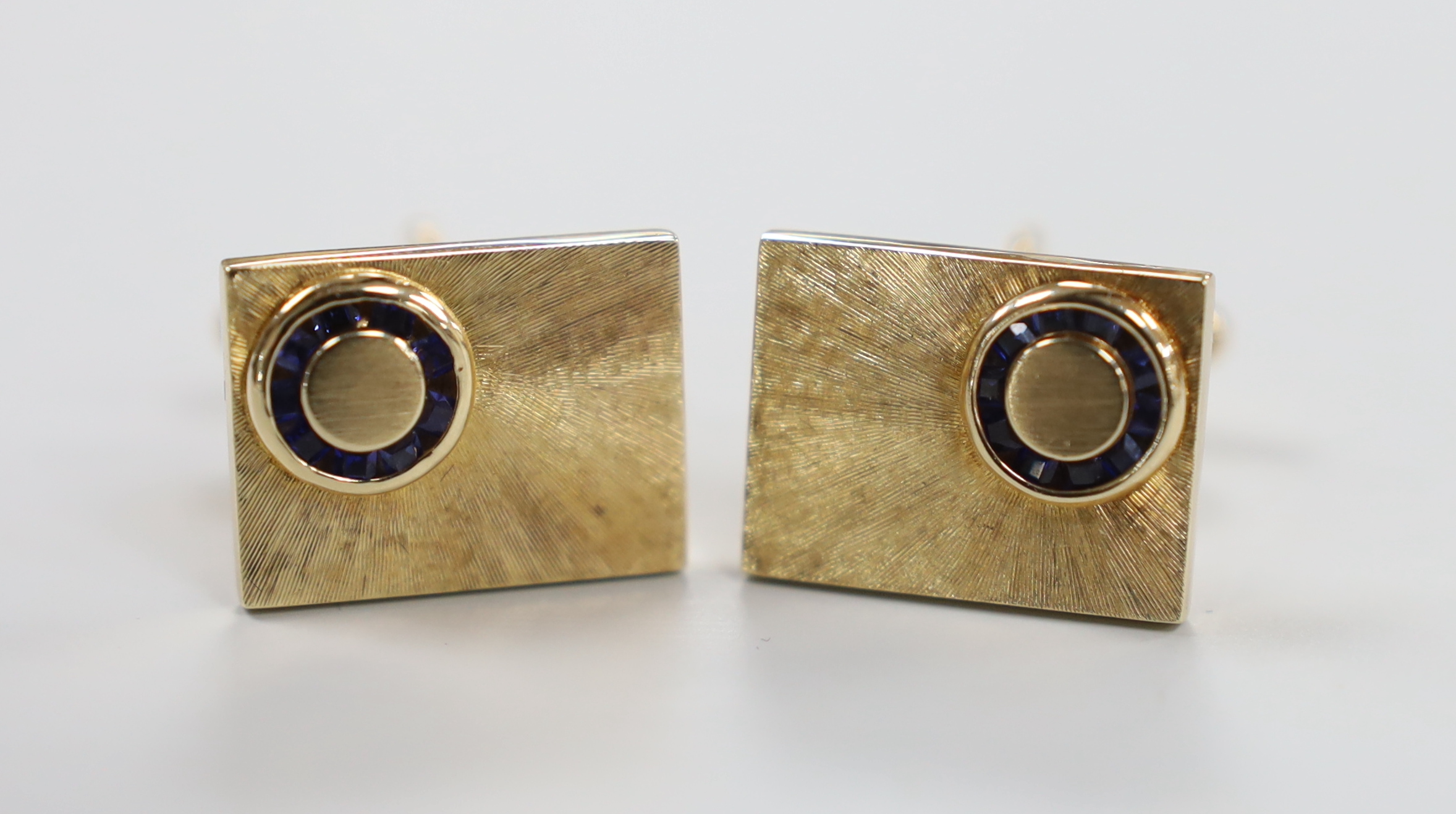 A modern pair of 14k yellow metal and sapphire cluster set rectangular cufflinks, 19mm, gross weight 11.6 grams.